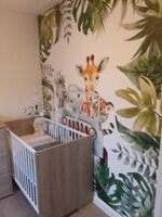 Behang jungle jeep met bladeren