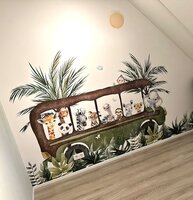 Behang jungle bus met bladeren